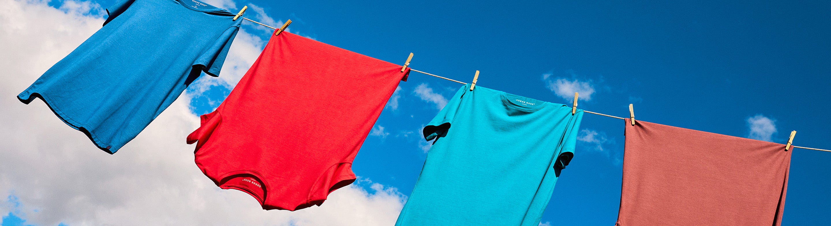 Derek Rose Basel T-Shirt's On Washing Line Against Blue Sky 